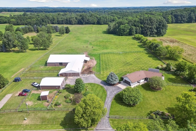 birds eye view of property featuring a rural view