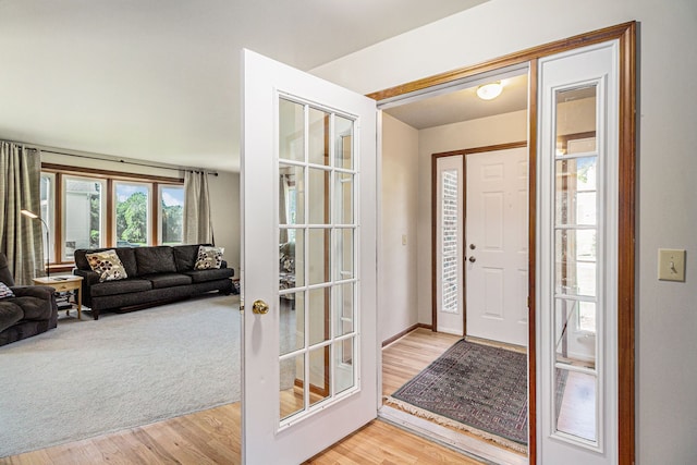 entrance foyer with light wood finished floors