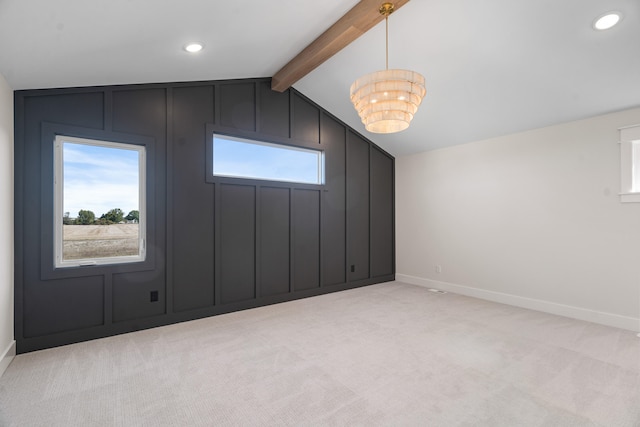 additional living space featuring a chandelier, light colored carpet, and lofted ceiling with beams