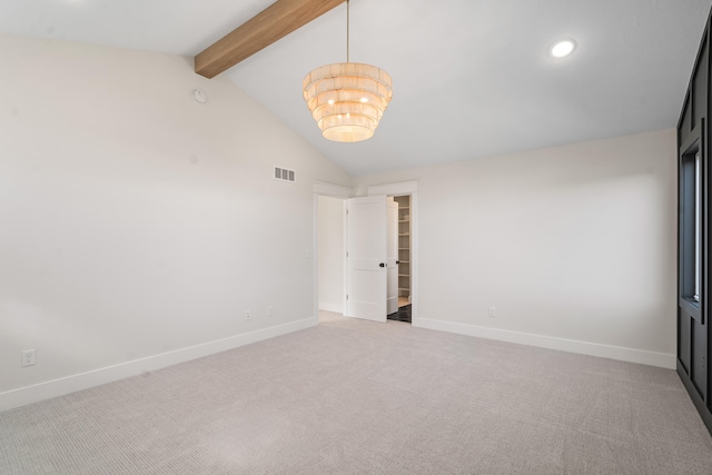 unfurnished room with carpet flooring, lofted ceiling with beams, and a notable chandelier