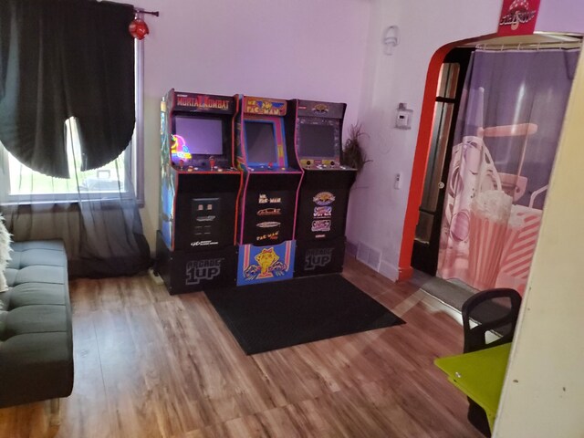 14153 Manning St, Detroit, MI 48205 - playroom with arched walkways and wood finished floors
