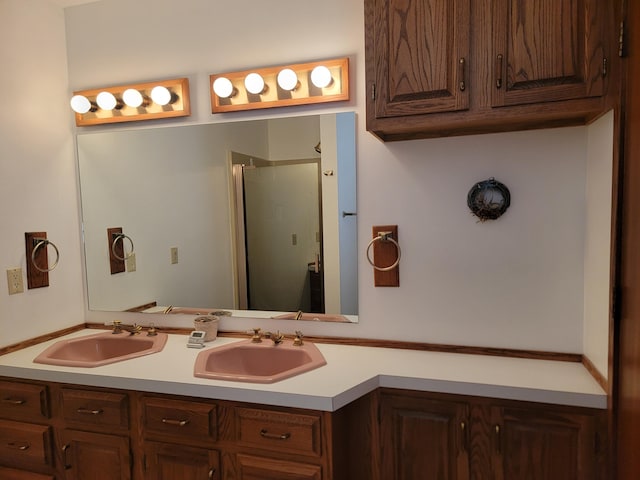 bathroom featuring vanity and walk in shower