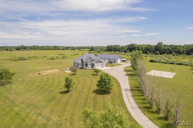 birds eye view of property featuring a rural view