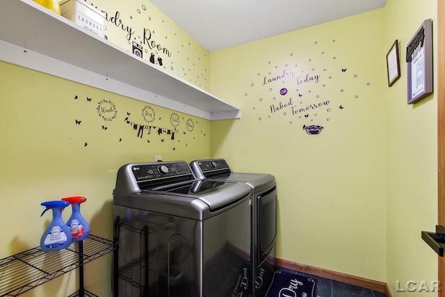 laundry room with washer and dryer