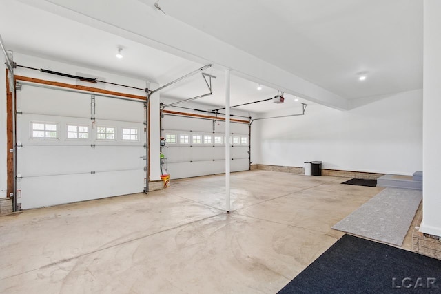 garage featuring a garage door opener