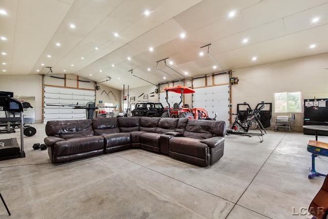 living room with high vaulted ceiling