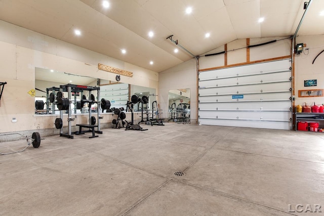 exercise room with vaulted ceiling