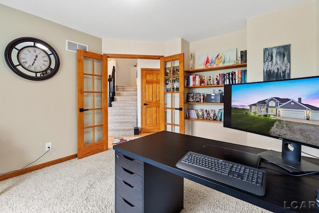 home office featuring carpet and french doors