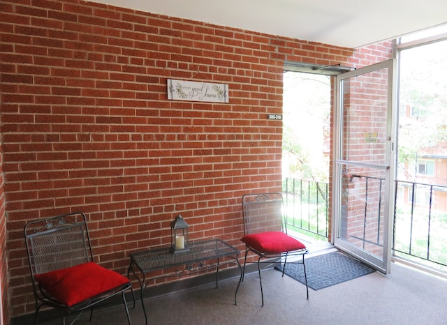 unfurnished sunroom featuring plenty of natural light