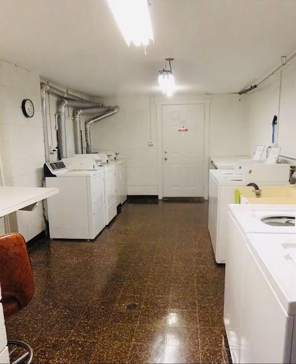 washroom with washer and clothes dryer