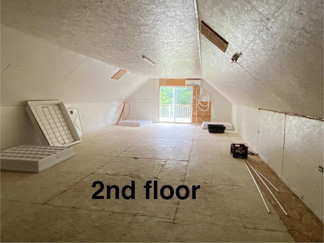 9400 Kruger Rd, Union Pier, MI 49129 - bonus room with a textured ceiling and lofted ceiling