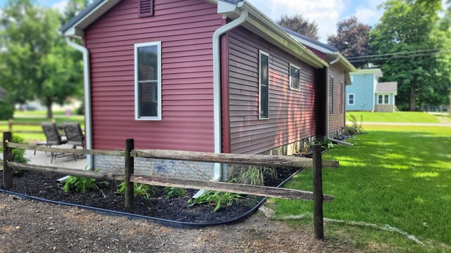 203 E Mill St, Athens, MI 49011 - view of home's exterior featuring a yard