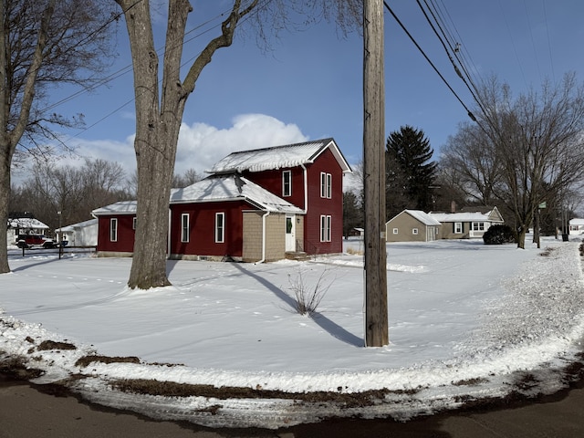 view of snow covered property