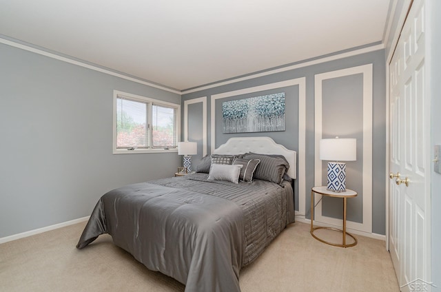 carpeted bedroom featuring ornamental molding