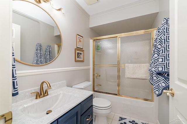 full bathroom with tile patterned floors, toilet, shower / bath combination with glass door, vanity, and ornamental molding