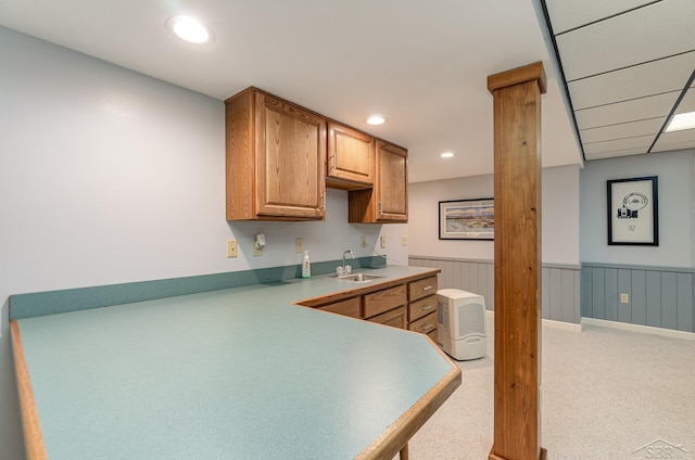 kitchen with a drop ceiling and sink