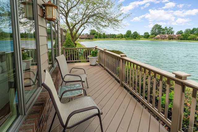 deck featuring a water view