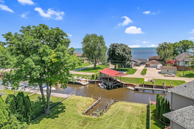 view of home's community with a boat dock and a water view