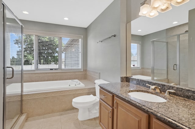 full bathroom featuring tile patterned floors, vanity, toilet, and shower with separate bathtub