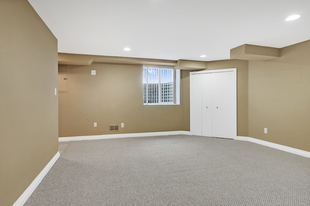 basement with carpet flooring