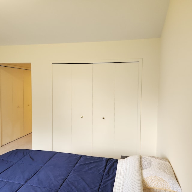 bedroom with light carpet