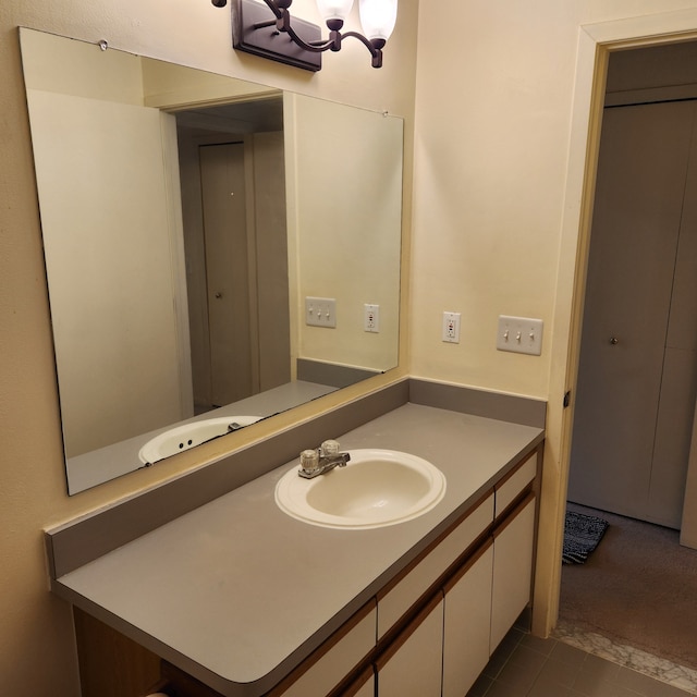 bathroom featuring tile patterned floors and vanity