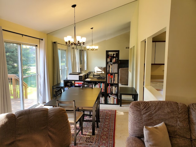 carpeted dining space with a chandelier and lofted ceiling