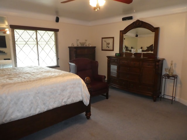 carpeted bedroom with ceiling fan