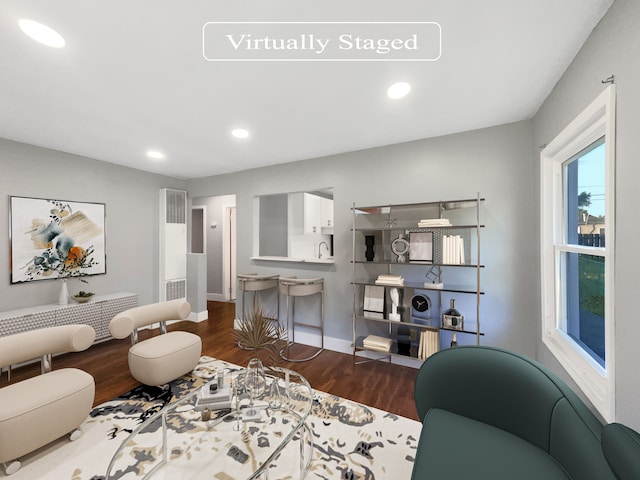 100 E Kalama Ave, Madison Heights, MI 48071 - living area with wood finished floors, recessed lighting, baseboards, and a heating unit