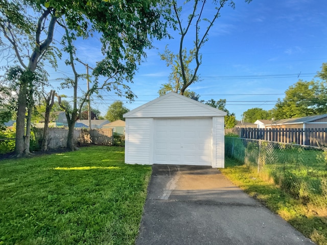 garage with a yard