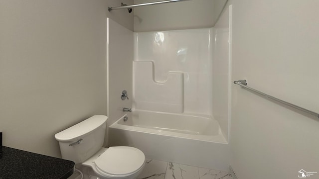 bathroom with shower / bathtub combination and toilet