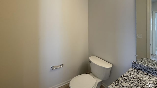 bathroom featuring toilet