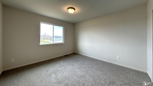 view of carpeted spare room