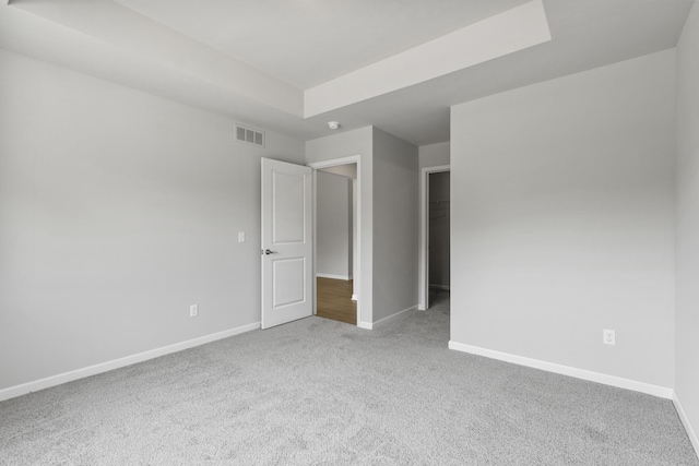 31433 Augusta Dr Unit 75, Romulus, MI 48174 - unfurnished bedroom featuring carpet, a walk in closet, and a closet