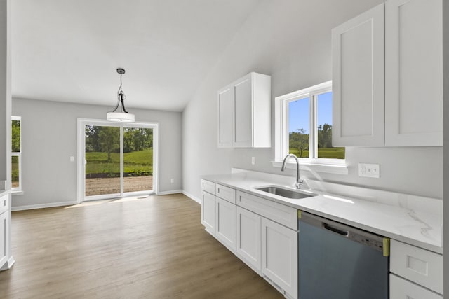 31433 Augusta Dr Unit 75, Romulus, MI 48174 - kitchen with dishwashing machine, white cabinets, light wood finished floors, pendant lighting, and lofted ceiling