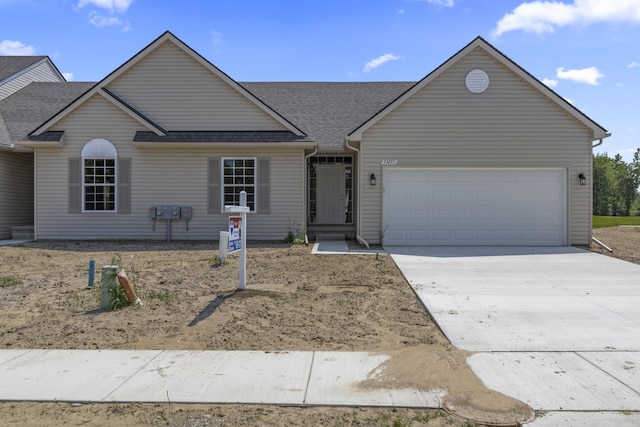 31433 Augusta Dr Unit 75, Romulus, MI 48174 - view of front of property with roof with shingles, an attached garage, and concrete driveway