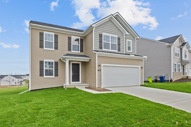 view of front facade with a garage and a front lawn