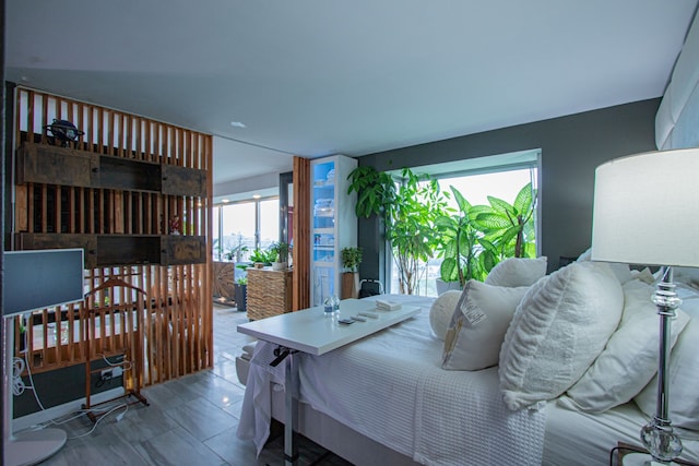 bedroom with multiple windows