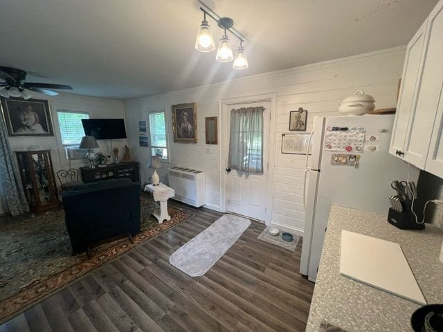 7153 Cedar Rd, Lexington, MI 48450 - interior space featuring a ceiling fan and wood finished floors