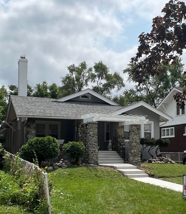 view of front of home with a front yard