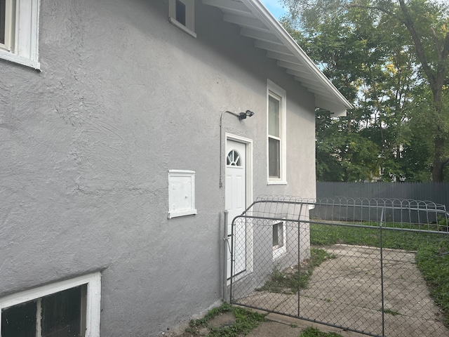 view of side of home featuring a patio area