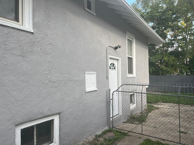 doorway to property with a patio area