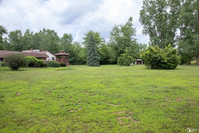 28237 W Huron River Dr, Huron, MI 48134 - view of green lawn with a gazebo