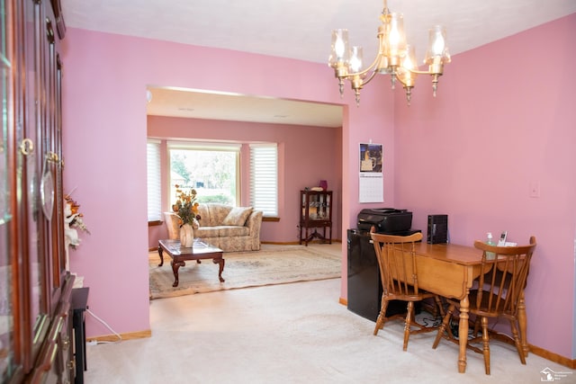 office area with light colored carpet and a chandelier