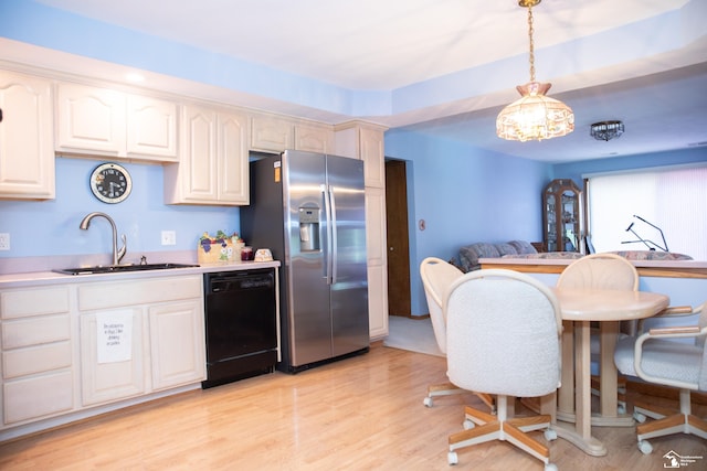 kitchen with dishwasher, sink, stainless steel fridge with ice dispenser, light hardwood / wood-style floors, and decorative light fixtures