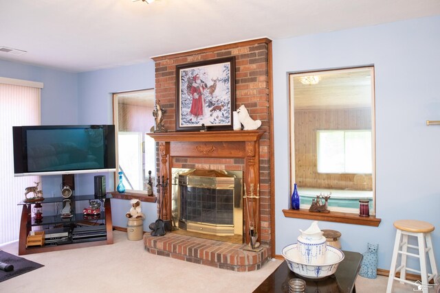 28237 W Huron River Dr, Huron, MI 48134 - carpeted living area with a fireplace