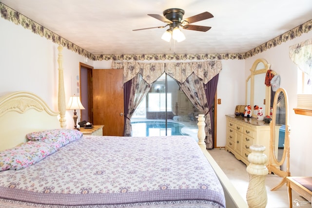 carpeted bedroom featuring ceiling fan and access to exterior