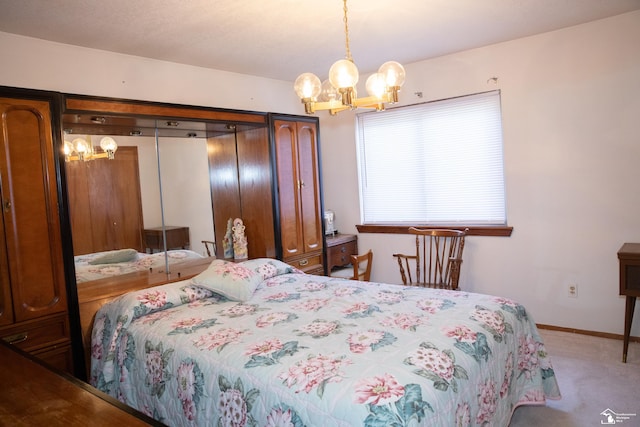 bedroom featuring light colored carpet and a chandelier