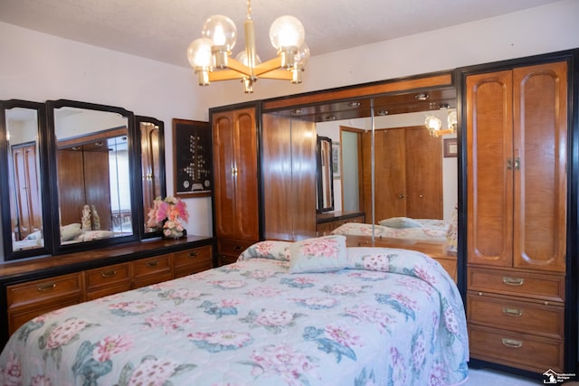 bedroom with an inviting chandelier