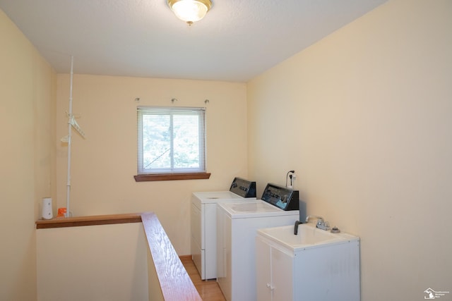 washroom featuring washing machine and dryer